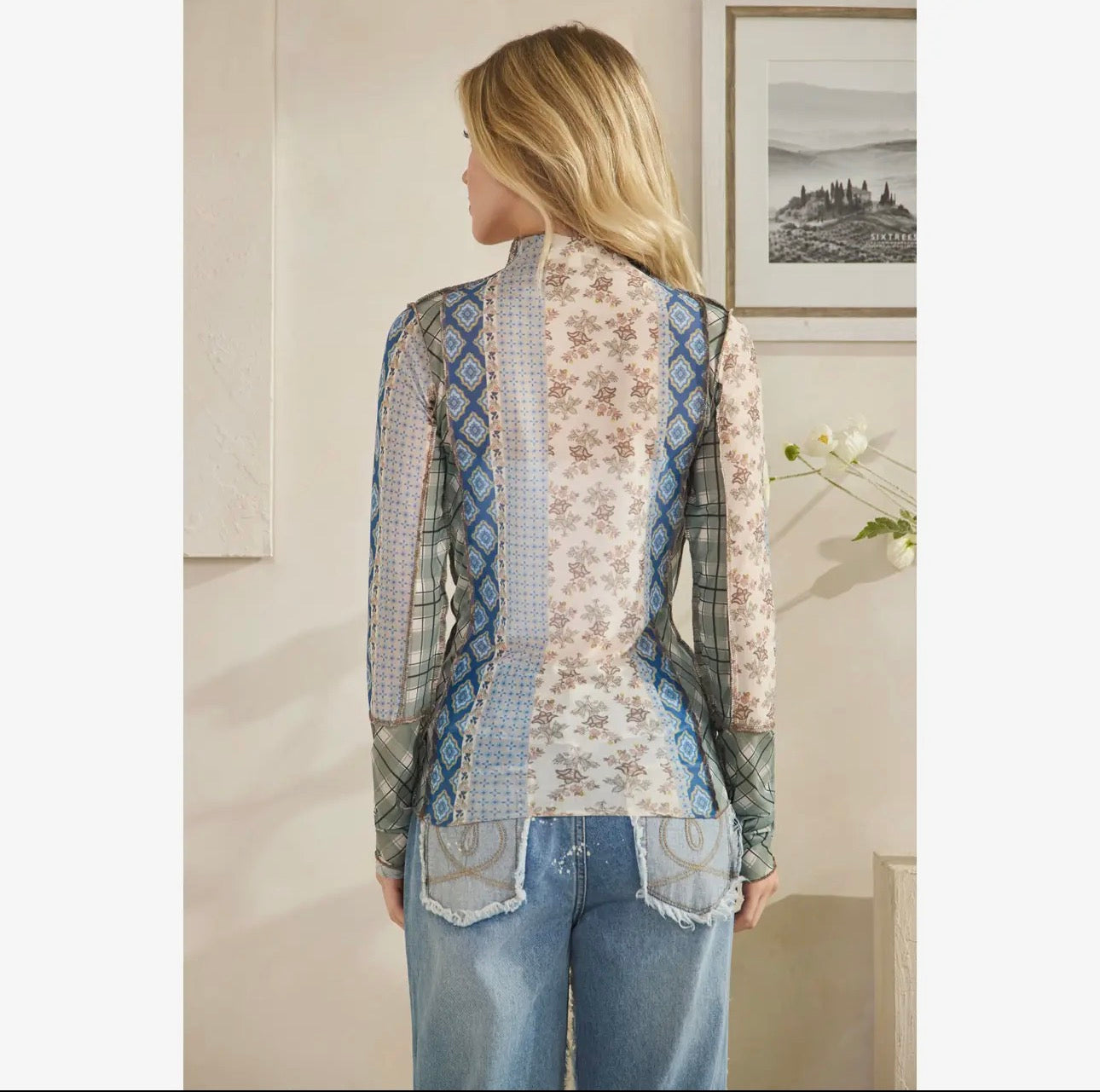 mixed print mesh top with merrow stitch detail and boho layered look