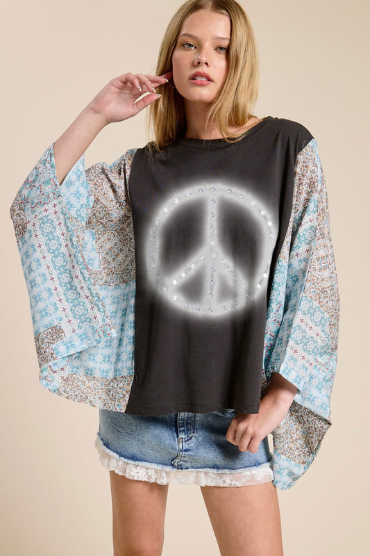 peace graphic boho contrast poncho top with puff brush print and relaxed fit