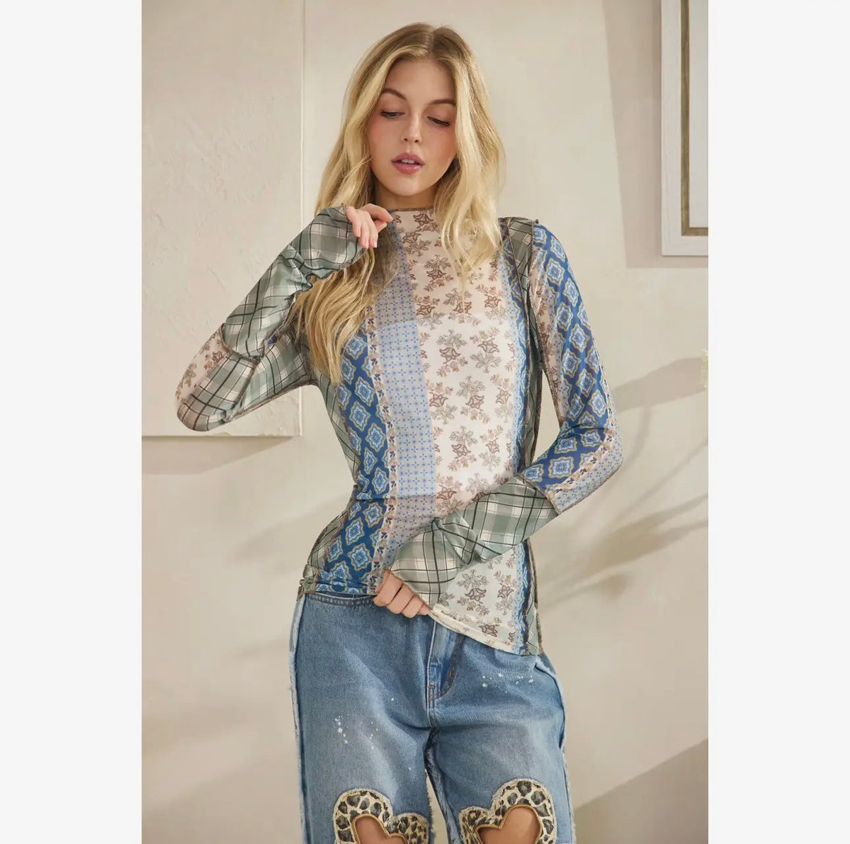 mixed print mesh top with merrow stitch detail and boho layered look