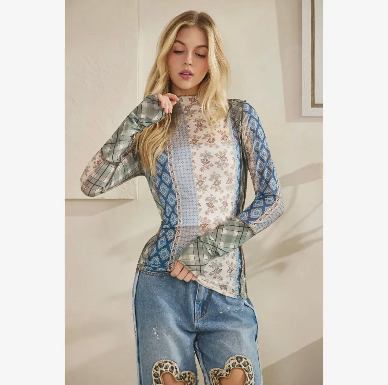 mixed print mesh top with merrow stitch detail and boho layered look