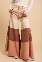 tiered contrast wide leg pants with layered fabric and relaxed silhouette