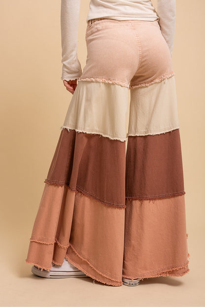 tiered contrast wide leg pants with layered fabric and relaxed silhouette